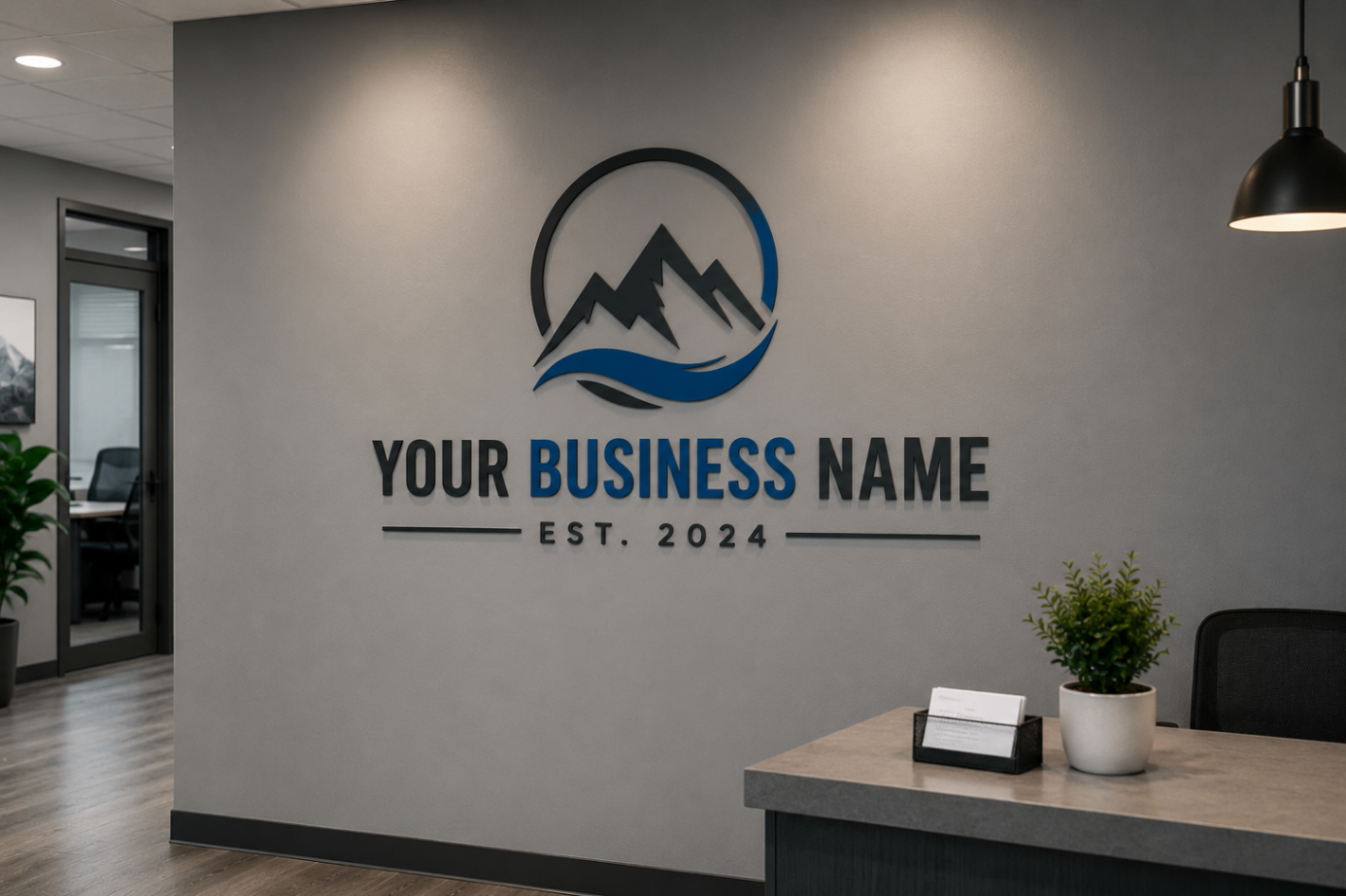 Dimensional vinyl logo and lettering mounted on an office wall